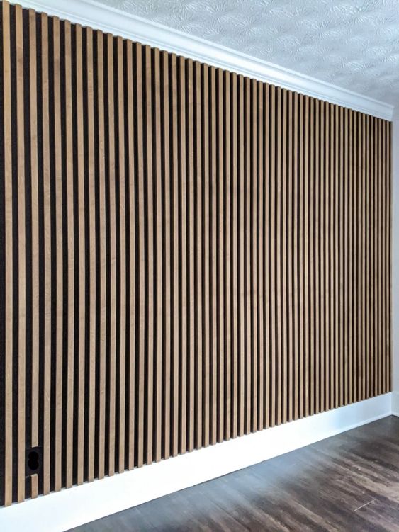 Wood panel wall slat with a modern living room decor.